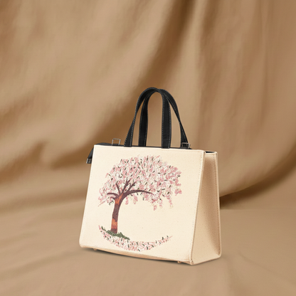 Handbag with a cherry blossom design on a beige background