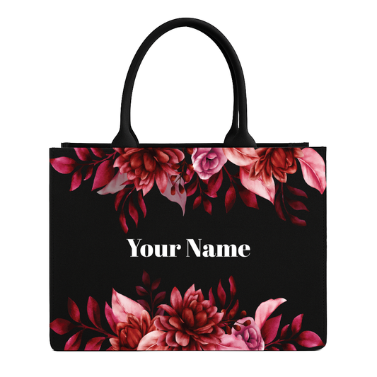 Tote bag with floral design and customizable text on a black background