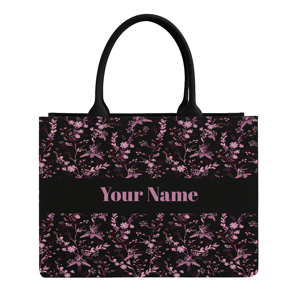 Tote bag with pink floral pattern and customizable name text on a white background