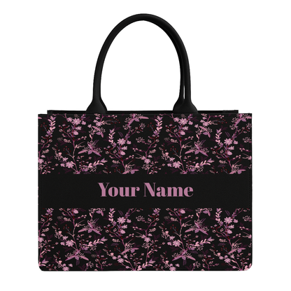 Tote bag with pink floral pattern and customizable name text on a white background