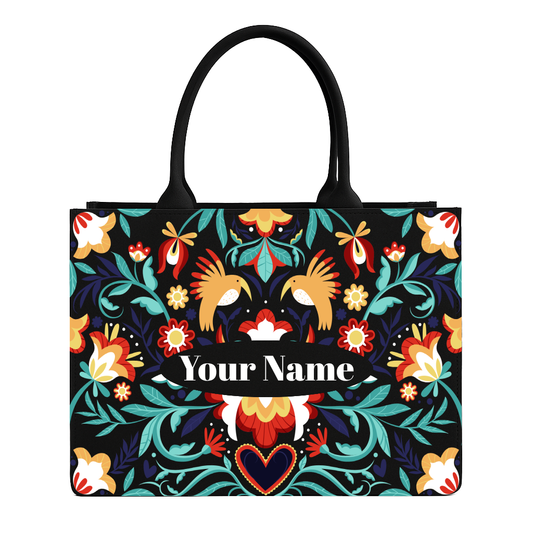 Colorful tote bag with floral and bird pattern on a white background