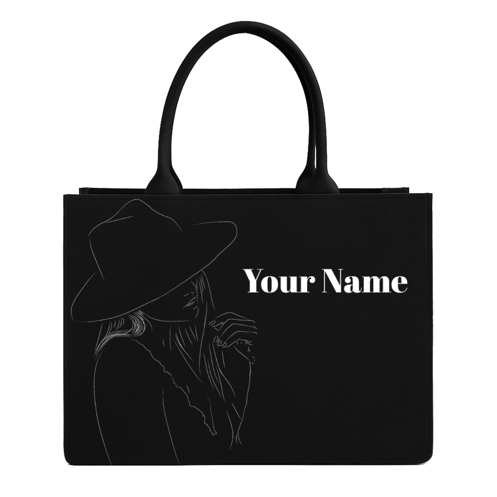 Black tote bag with a silhouette of a person wearing a hat and the text 'Your Name' on a white background